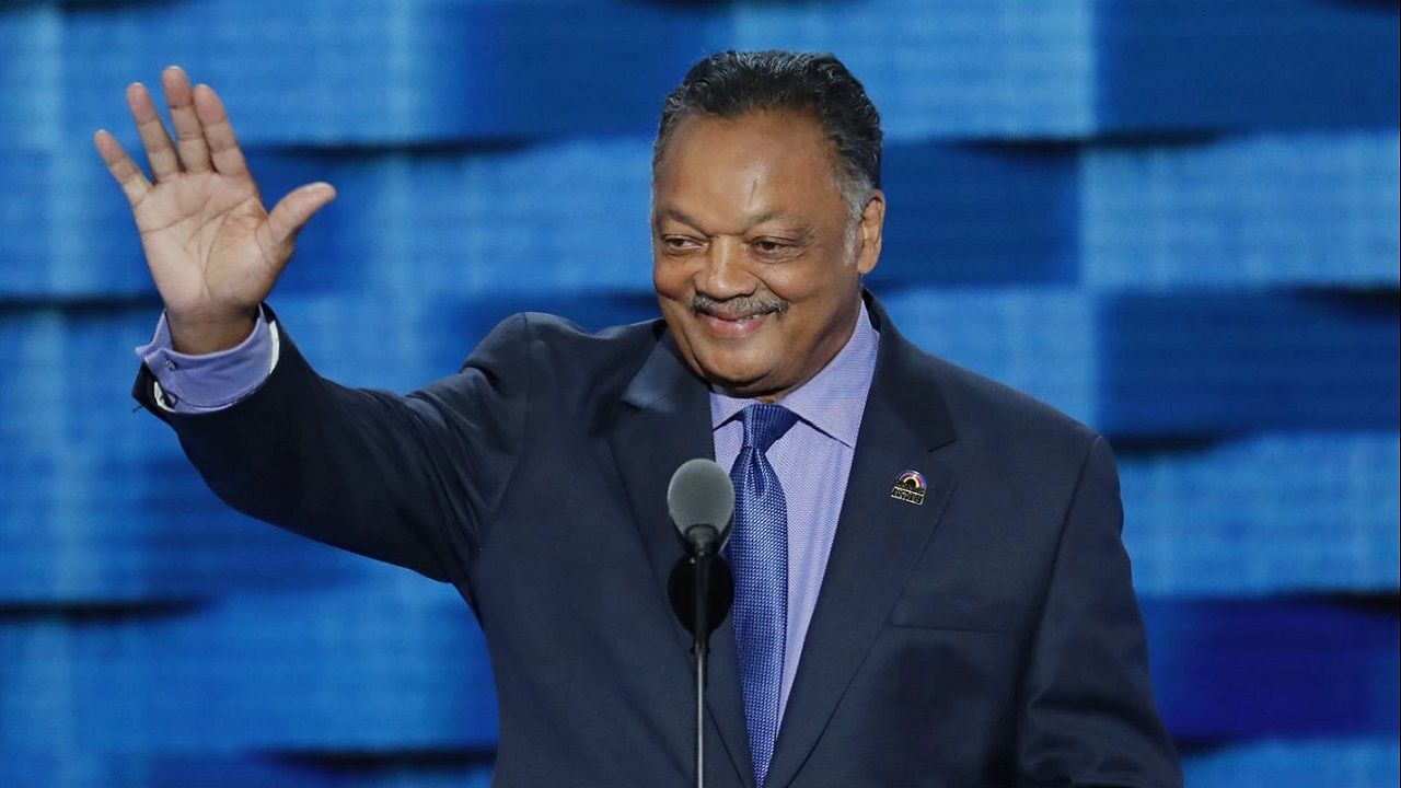 Rev. Jesse Jackson waves as he steps to the podium during the third day of the Democratic National Convention in Philadelphia, July 27, 2016. (AP Photo/J. Scott Applewhite)