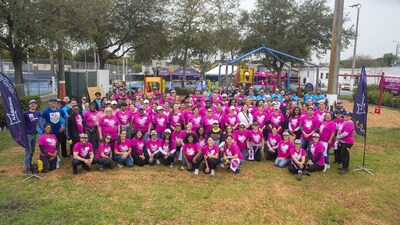 Ambetter Health volunteers gathered in front of the new playground at Southeast Park.