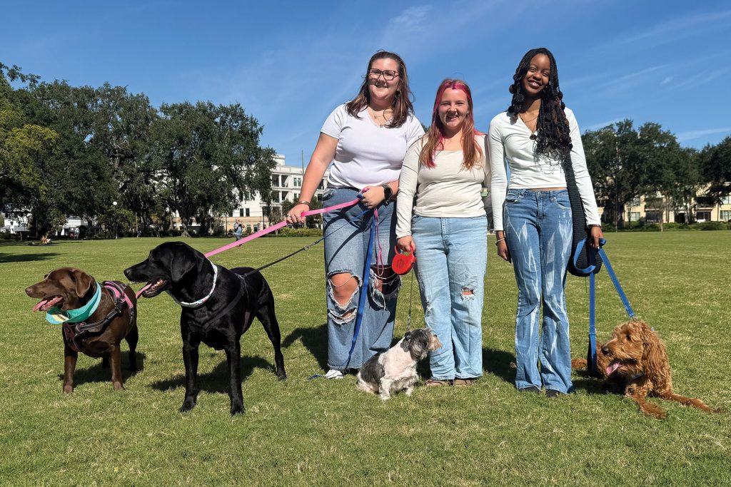 Wolfson Paw Society members and their pets: Brownie and Buddy with owner Natalie Shepard; Manny with owner Ella LeMieux and Lynah McElroy with her dog Franklin