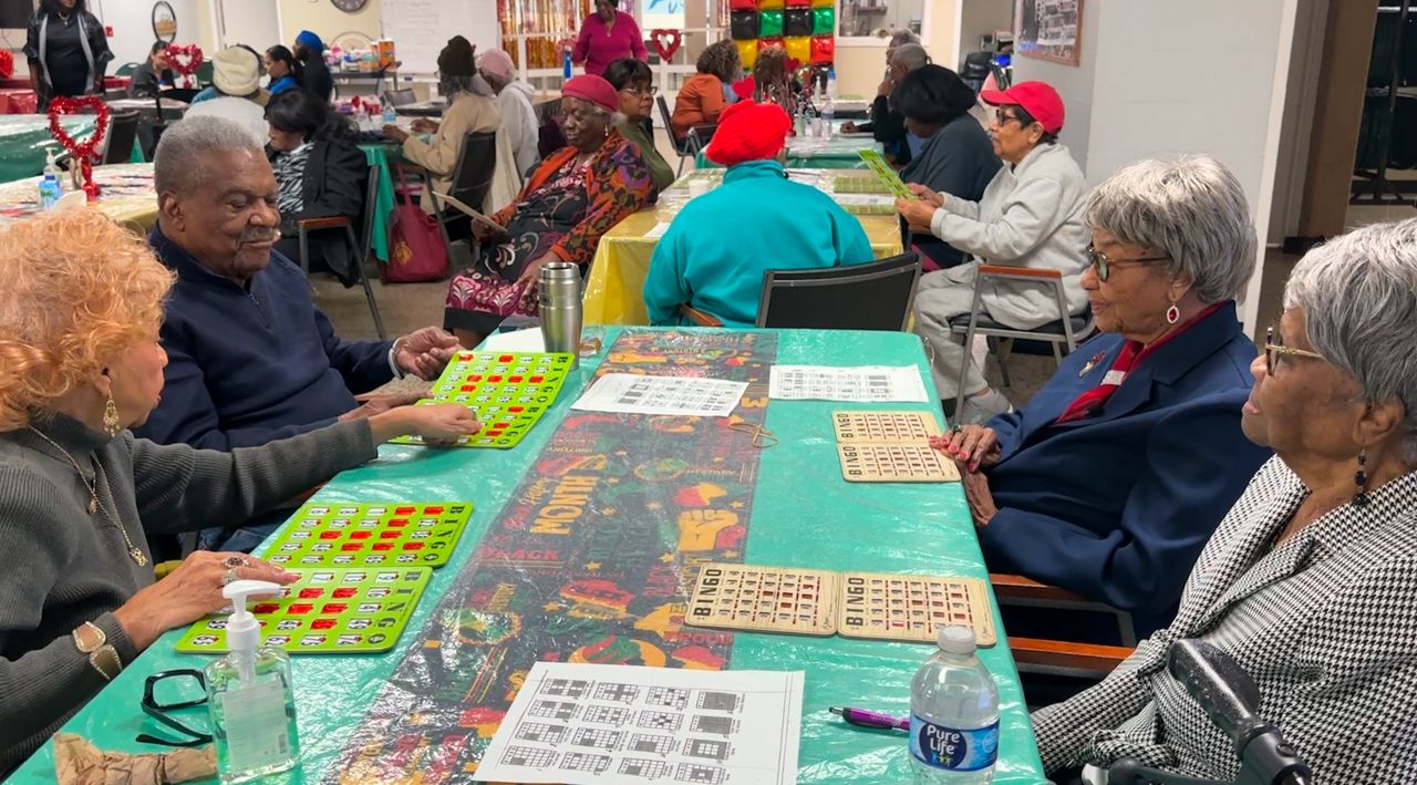 Amanda Page and her friends at the Progress Village Senior Center. (Spectrum News)