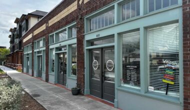 Exterior of a brick building with bookstore signage over the front door