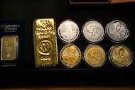 Investment gold and silver are displayed by the Mint of Poland in Warsaw, Poland, Tuesday,...