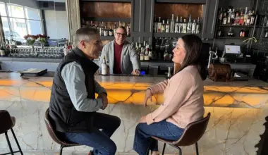 The owners of Cafe San Marco and Bar San Marco sit at the bar.