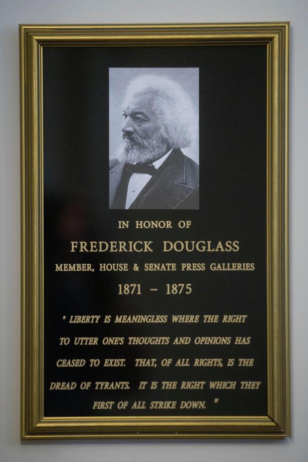 A plaque is seen for the dedication of the House Press Gallery to honor Frederick Douglass, during on Capitol Hill, Thursday, Feb., 12, 2026, in Washington. Frederick Douglass was the first African American reporter admitted into the Capitol press galleries. (AP Photo/Rod Lamkey, Jr.)