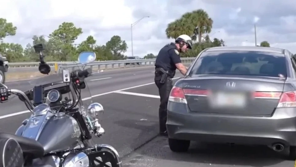 Officer Christian Madsen making a traffic stop.