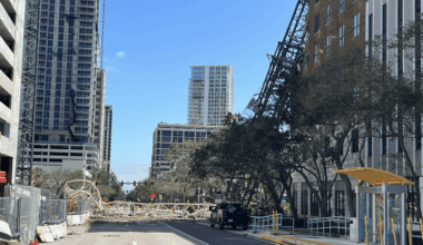 crane hitting times building