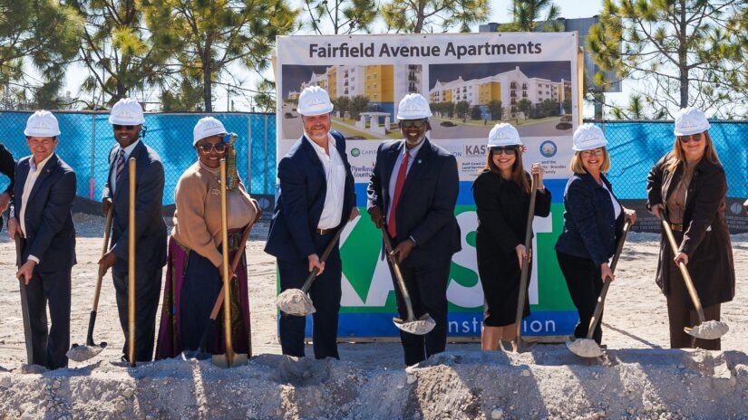 Local Pinellas and St. Petersburg officials shovel dirt at the new Fairfield Avenue Apartments
