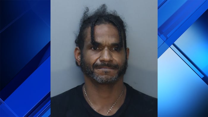 Man accused of throwing beer bottle through car windshield in Miami Beach, spitting on hood