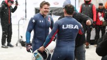 LAKE PLACID, NEW YORK - MARCH 09: Frank Del Luca and Charles Volker of Team United States celebrate after finishing in fourth place following the 2-Man Bobsleigh Race Heat 4 on day four of the 2025 IBSF World Championships at Mt Van Hoevenberg on March 09, 2025 in Lake Placid, New York.  (Photo by Al Bello/Getty Images)