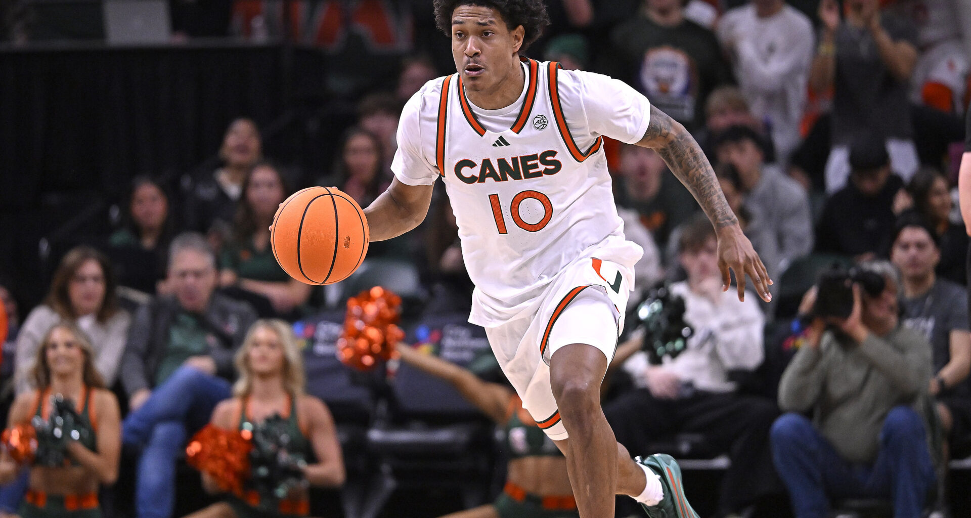 CORAL GABLES, FL - JANUARY 28: Miami guard Tru Washington (10) brings the ball up court in the second half as the Miami Hurricanes faced the Stanford Cardinal on January 28, 2026, at the Watsco Center in Coral Gables, Florida. (Photo by Samuel Lewis/Icon Sportswire via Getty Images)