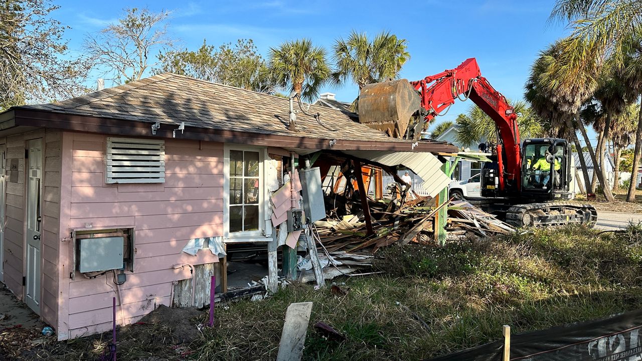 A backhoe tore down the historically designated Pass-a-Grille shuffleboard clubhouse on Thursday after it was damaged by hurricanes in 2024.(Spectrum News/Josh Rojas)