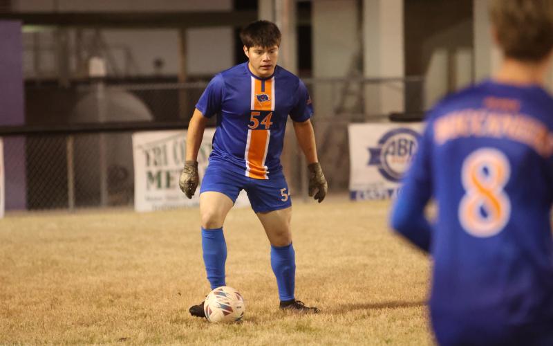 Branford's David Lopez gathers possession against Hamilton County in the District 2-2A championship on Jan. 27. (PAUL BUCHANAN/Lake City Reporter)