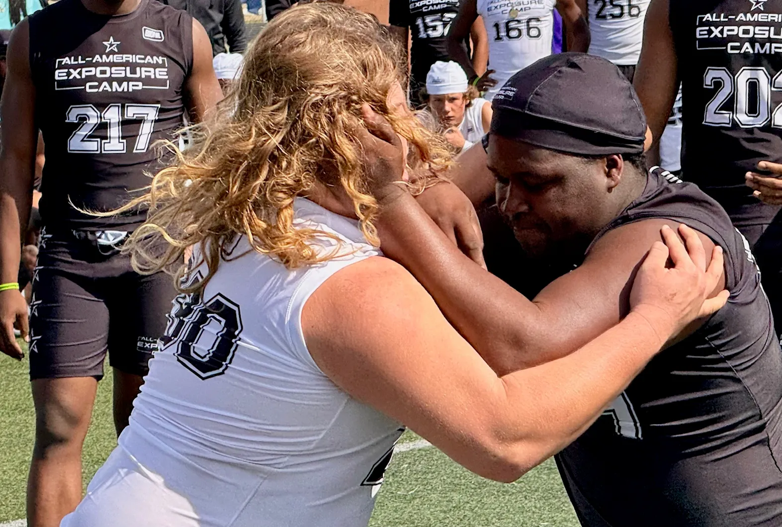 Deltona junior Brayden Koch battles South Lake senior Latraverick Anderson...