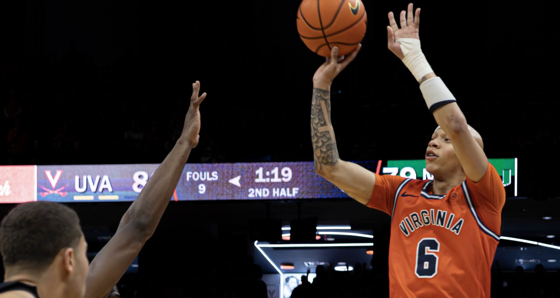 No. 14 Cavaliers pull out 86-83 victory over Miami as Bennett is honored in pregame ceremony