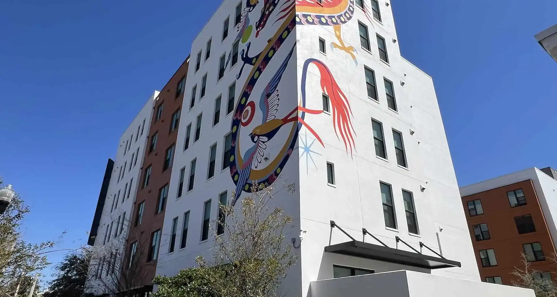 building with dragon mural on it