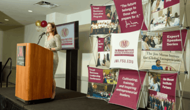 Jennifer Kovach, director of the Jim Moran Institute’s South Florida region, speaks at the JMI South Florida Fall 2025 Executive Programs graduation. (Photo by David I. Muir/Island Syndicate)