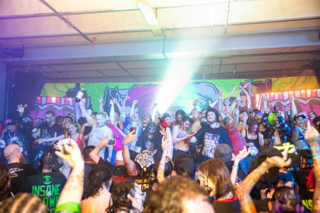 Photo of people on stage at Juggalo Weekend’s First Night in Miami
