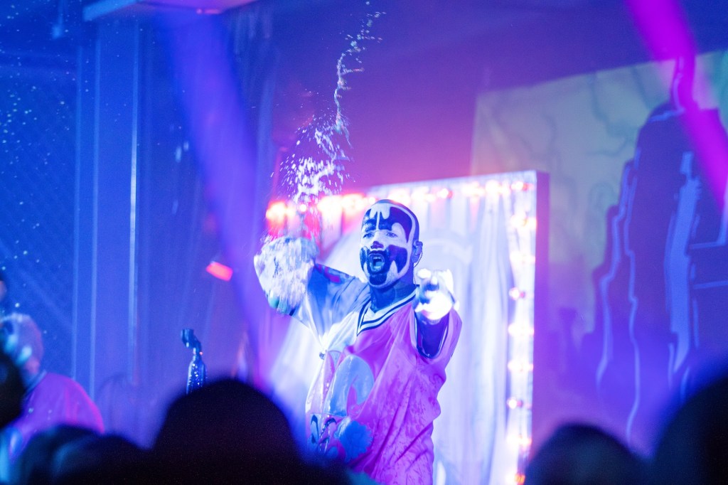 Photo of a man on stage with his face painted Juggalo Weekend in Miami