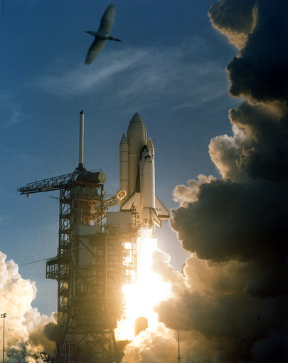 Space Shuttle Columbia (STS-1) launches from the launch pad at...