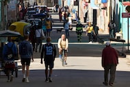 People walk and cycle along a street in Havana, Cuba, on Tuesday, Feb. 10, 2026. Cuba is no...