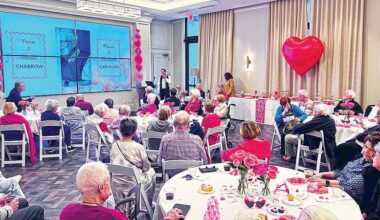 Photo installation features couples at Belmont Village Senior Living