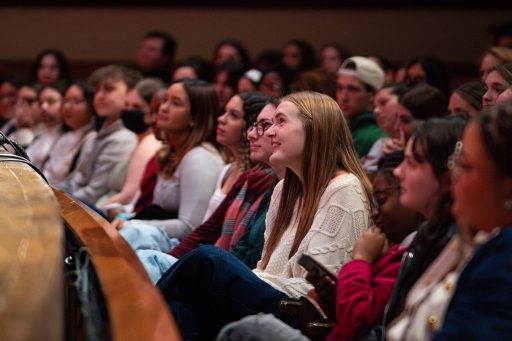 Students listen to Leslie Odom, Jr. speak at the Golden Torch Lecture Series during MLK Week.