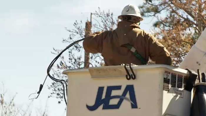 Crews deal with extreme cold, fallen limbs to restore power for thousands across Northeast Florida amid Arctic Blast
