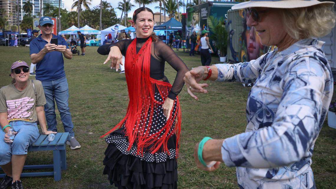 Flamenco dancer Monika Lange with Luna Cale USA, center, dances with Tara Garcia, 81, right, during her performance at the 62nd Coconut Grove Festival. The 62nd Coconut Grove Arts Festival returned to the Coconut Grove waterfront over Presidents Day weekend. Centered at Regatta Park in Dinner Key Marina overlooking Biscayne Bay, the festival spanned McFarlane Road, Pan American Drive and South Bayshore Drive, where the works of more than 275 artists were on display on Sunday, February 15, 2026, in Miami, Florida.