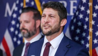 Florida Attorney General James Uthmeier, right, speaks alongside federal and state law enforcement officials during a press conference at the FDLE Miami Regional Operations Center on Thursday, Feb. 19, 2026, in Miami.