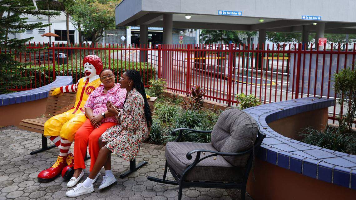 Thekle Charles, left, talks with her daughter Janelle Charles, right, as they recall their experiences at the Ronald McDonald House during Janelle’s cancer treatment at Jackson Memorial, on Wednesday, Feb. 18, 2026, in Miami.