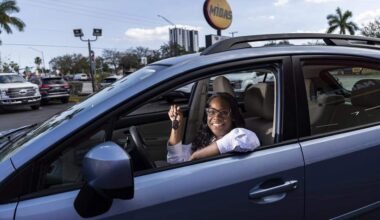 Renee King, 36, is photographed inside the refurbished Subaru Impreza she was gifted at a Midas on Thursday, Feb. 12, 2026, in Fort Lauderdale, Fla. King, a single mom with two children, was forced to give up her previous car and relied entirely on public transportation to get to work.