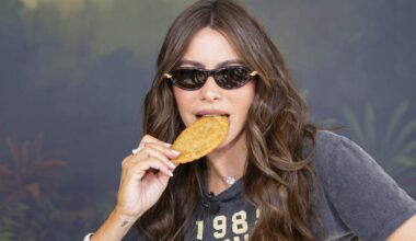 Colombian-American actress Sofía Vergara bites into a TOMA Empanada as she attends the Goya Foods' Grand Tasting Village during the Food Network South Beach Wine & Food Festival on Saturday, Feb. 21, 2026, in Miami Beach, Fla.