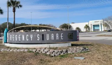 The Regency Square mall sign with the Impact Chrucy building in the background