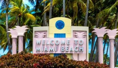 A sign welcomes visitors to Miami Beach.