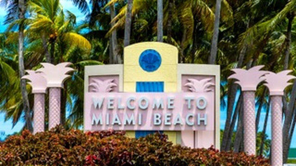 A sign welcomes visitors to Miami Beach.