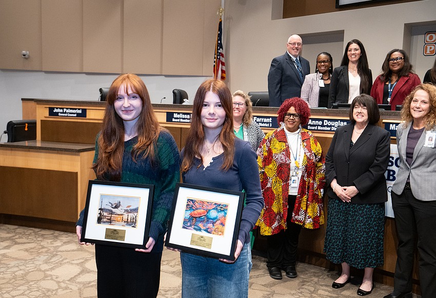 Orange County School Board recognizes two Dr. Phillips High students for artwork