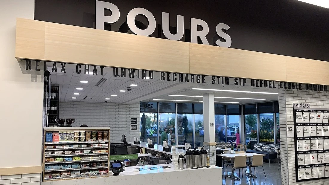 A Public Pours stand inside a Publix grocery store.