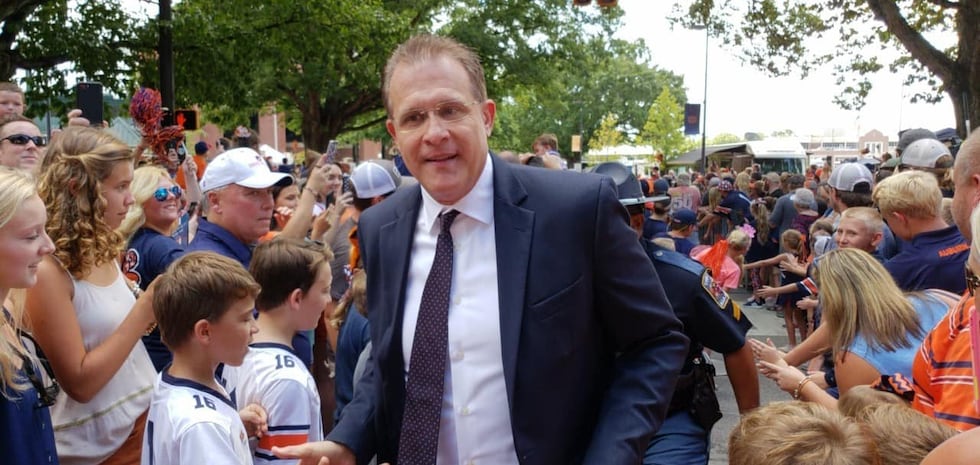 Former Auburn head coach Gus Malzahn walks to Jordan-Hare Stadium for the Tigers' game against...