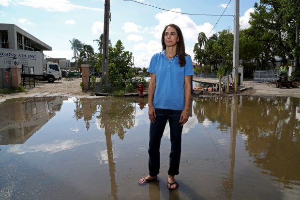 Dr. Jennifer Jurado, Broward's Chief Climate Resilience Officer, along Mola Avenue off Las Olas Boulevard, where impact from king tides have become increasingly severe. New construction in this area requires the land and seawall to be elevated.