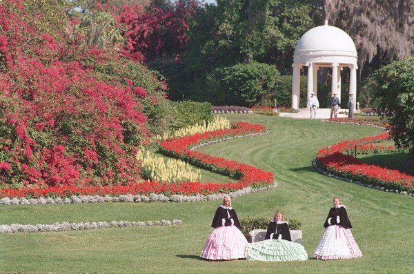 The Southern Belles at Cypress Gardens. The Veranda in the background is made from a World War II satellite dish and the pillars are from an Ybor City Cigar factory. (Sentinel file)