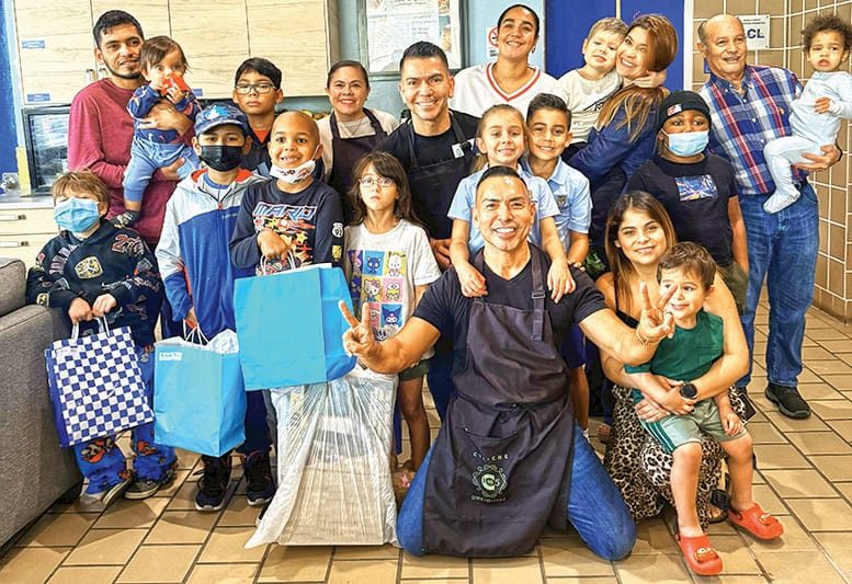 Chef Chipoco serves meals at Ronald McDonald House