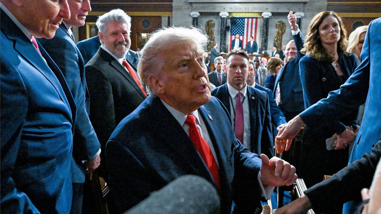 President Donald Trump exits the House Chamber after delivering the State of the Union address to a joint session of Congress in the House chamber at the U.S. Capitol in Washington, Tuesday, Feb. 24, 2026. (Kenny Holston/The New York Times via AP, Pool)