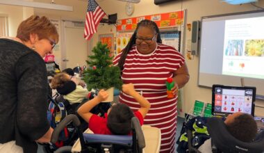 Paraprofessional Tamara McKinney (right) works with her students. (Spectrum News)