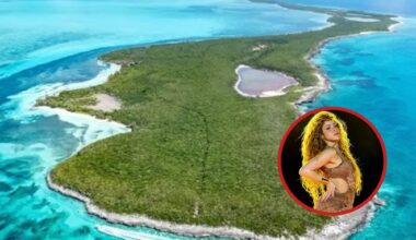 an island surrounded by bright blue waters