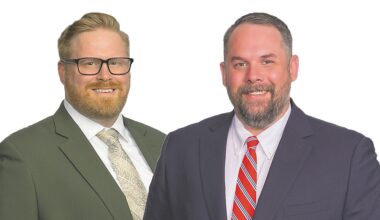 Two associate attorneys promoted to partner at Taylor, Day, Grimm & Boyd