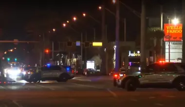 Jacksonville Beach police block traffic to investigate a shooting.