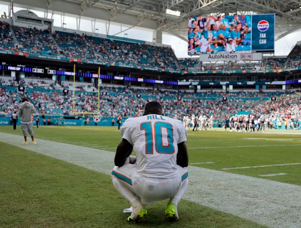 Miami Dolphins wide receiver Tyreek Hill watches as time runs out in the loss to the New England Patriots on Sunday, Sept. 14, 2025, at Hard Rock Stadium in Miami Gardens. (Joe Cavaretta/South Florida Sun Sentinel)
