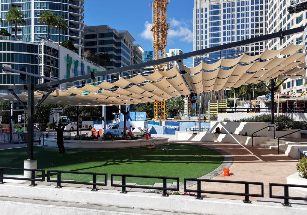 Tunnel Top Plaza now has shade. Critics would prefer trees.