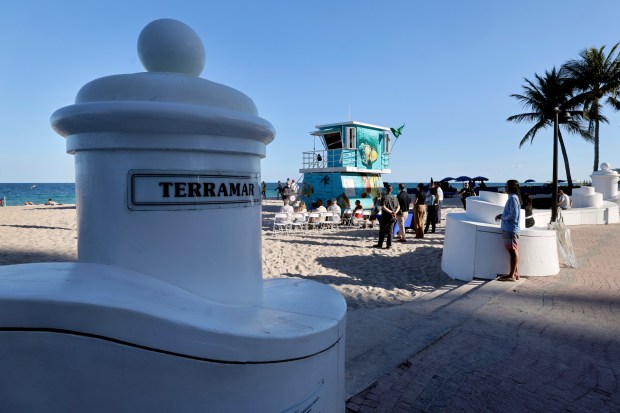 The lifeguard tower at Terremar Street on Fort Lauderdale beach, Tuesday, Feb. 10, 2026, is part of the newly completed Lifeguard Tower Public Art Project, featuring murals by artist Timothy Robert Smith. (Mike Stocker/South Florida Sun Sentinel)