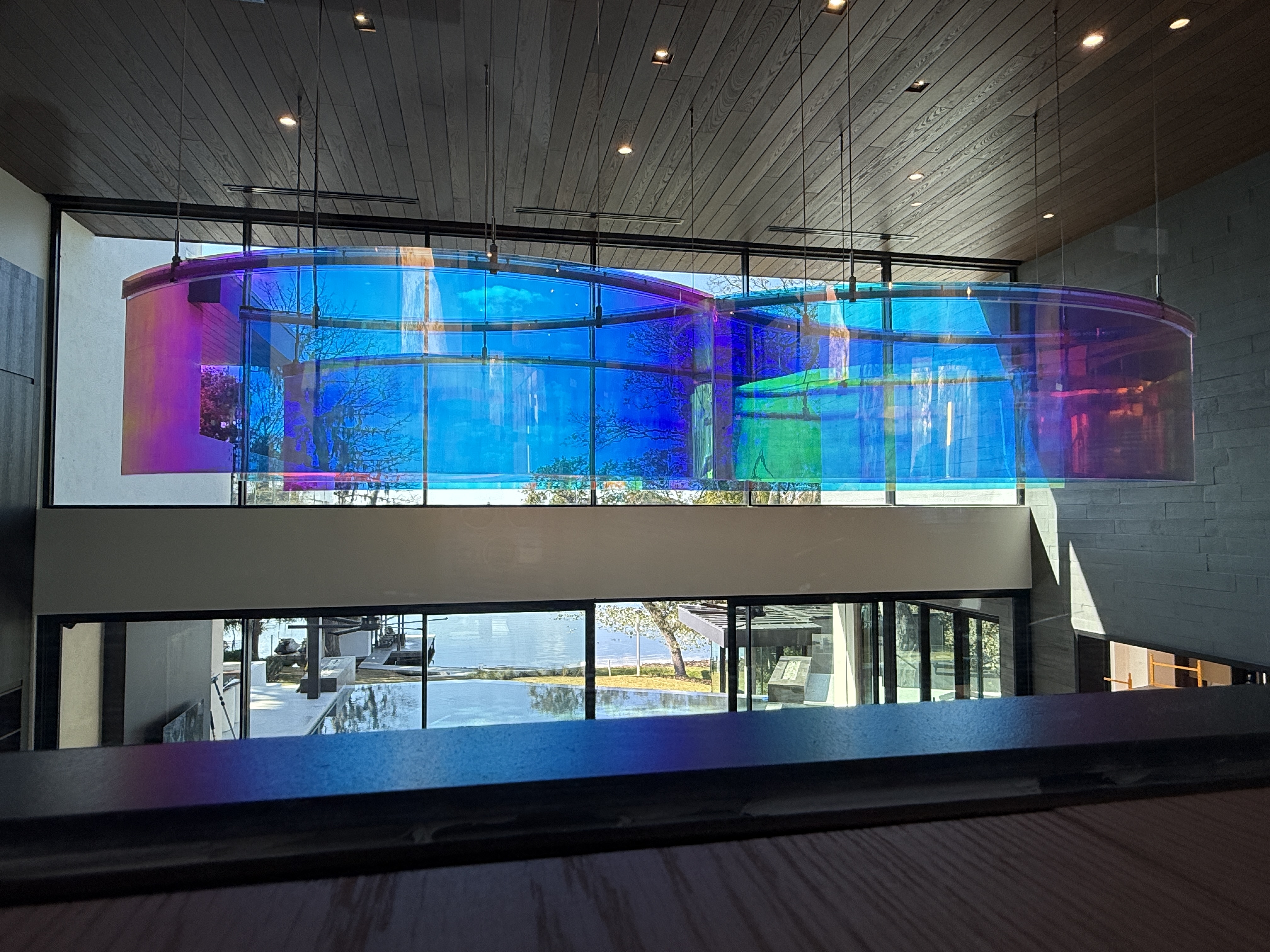 The chandelier has programmable LED lights embedded into the edge...